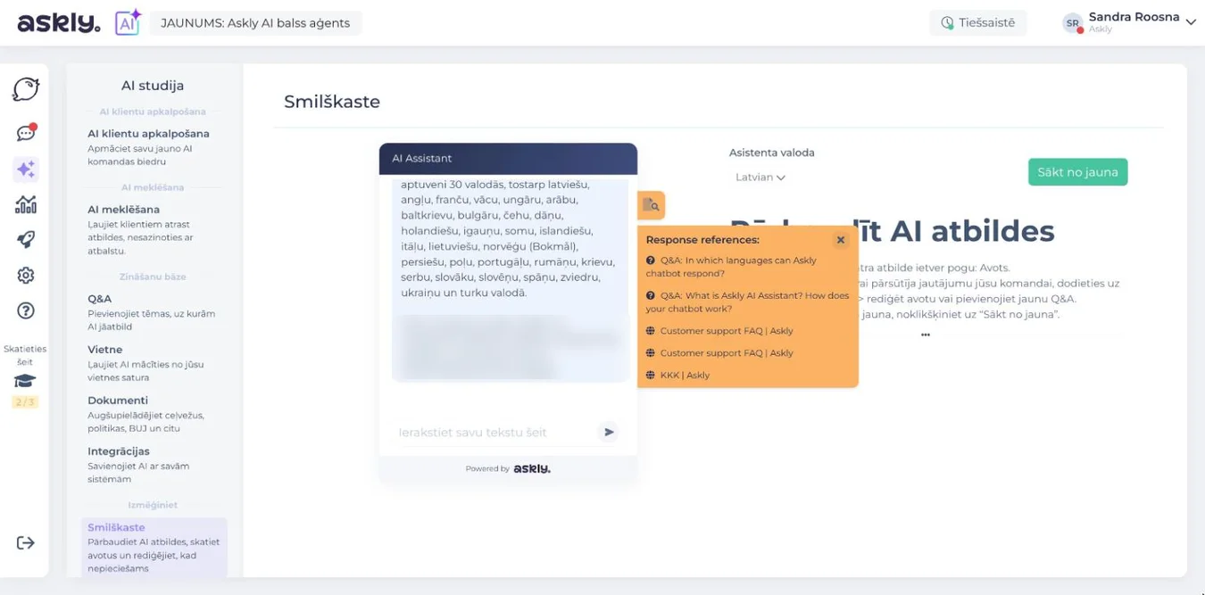 Askly smilškaste: AI atbilde un oranžais avotu logs ar lapām, ko AI izmantoja